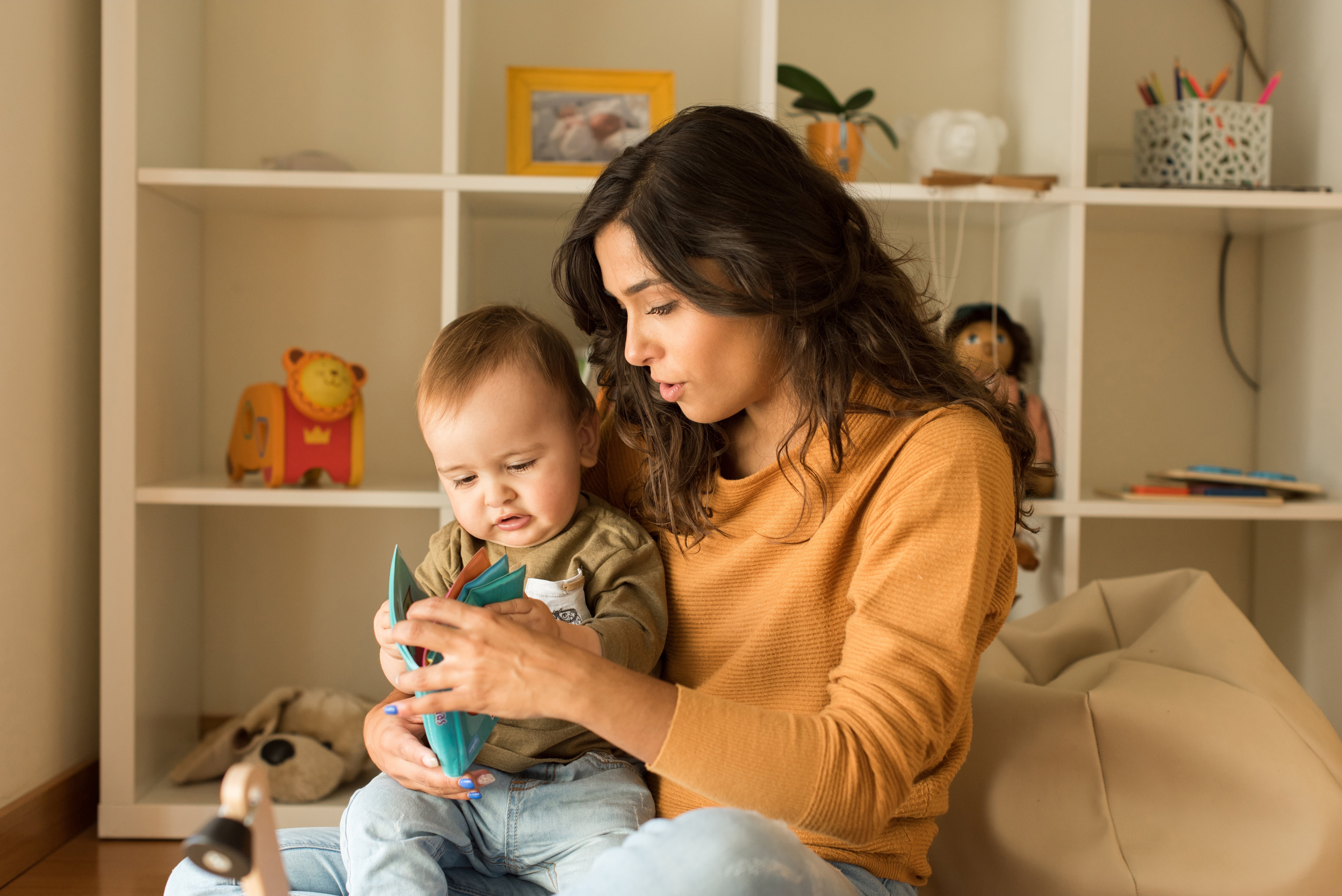 Mom reading with infant